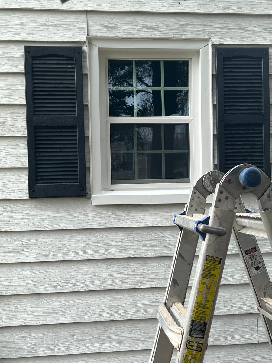 Window after repair — new sill and trim, wrapped and sealed
